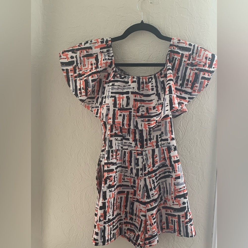 Like New  love...ady Asymmetrical Romper in Black, White, and Red Abstract Print
